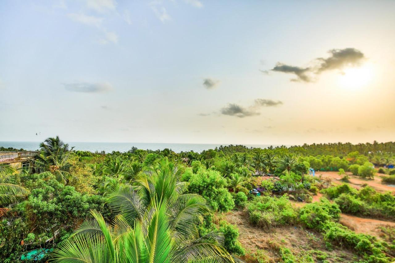 Oyo 13311 The White Feather Hotel มานเดรม ภายนอก รูปภาพ