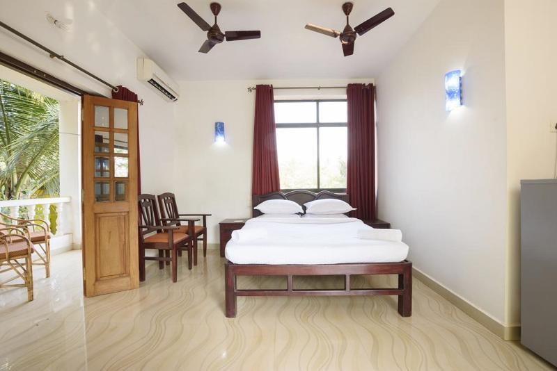 Oyo 13311 The White Feather Hotel มานเดรม ภายนอก รูปภาพ